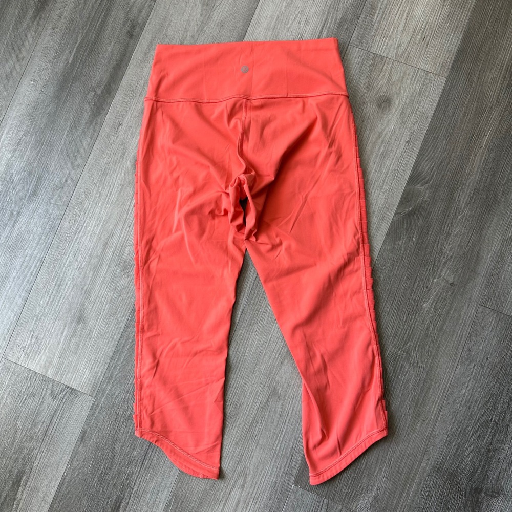 Lululemon Coral High Rise sunshine salutation crop Leggings Train Size 8